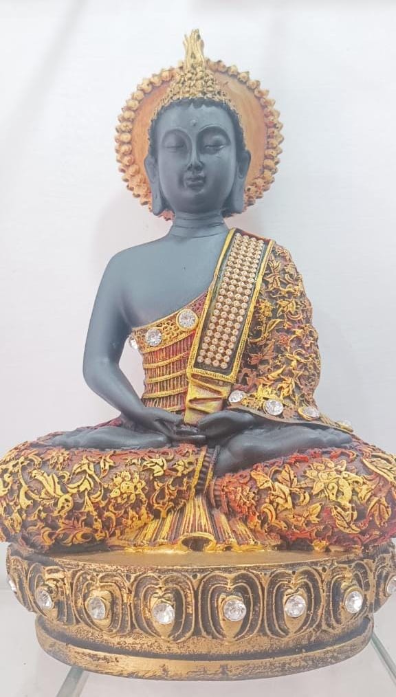 decorative polyresin Buddha statue in a meditative posture.
