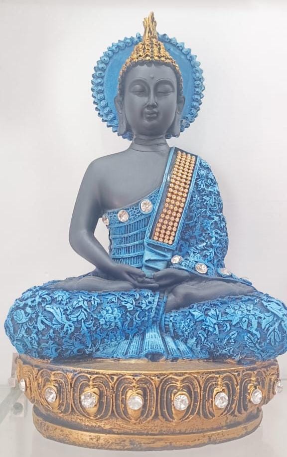 decorative polyresin Buddha statue in a meditative posture.