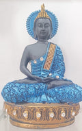 decorative polyresin Buddha statue in a meditative posture.
